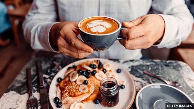 Is it unhealthy to drink coffee with your meal?